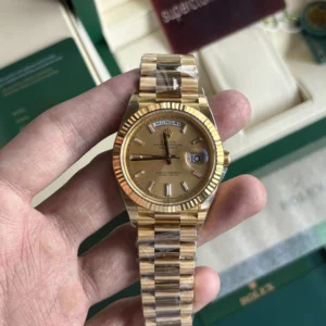 Rolex Day-Date 40 Yellow Gold Champagne Dial Baguette Diamond Hour Markers Clone