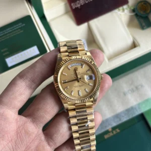 Rolex Day-Date 40 Yellow Gold Champagne Dial Baguette Diamond Hour Markers Clone