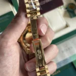 Rolex Day-Date 40 Yellow Gold Champagne Dial Baguette Diamond Hour Markers Clone - Image 3